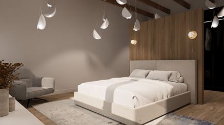 Sypialnia z drewnianą ścianą za łóżkiem i lekkimi, wiszącymi lampami