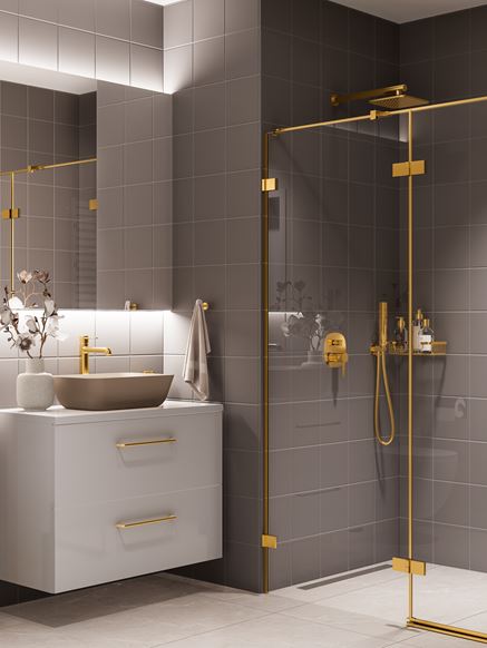 Szaro-brązowa łazienka ze złotymi akcentami
