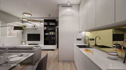 Widok na aranżację otwartej strefy kuchennej w nowoczesnym mieszkaniu