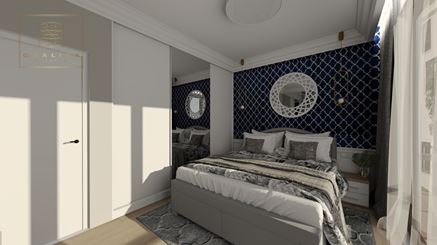 Sypialnia w stylu Hamptons z granatową tapetą