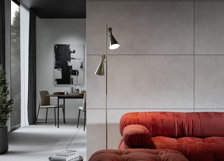 Ściana w salonie w wykończeniu płytkami z kolekcji Cerrad Modern Concrete