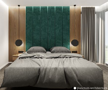 Sypialnia z lamelami i zieloną tapicerką za łóżkiem