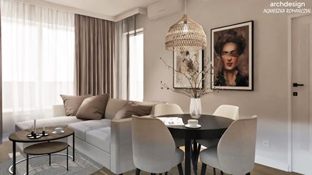 Jadalnia z czarnym stołem w malym salonie