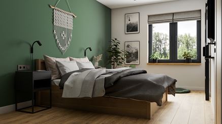 Sypialnia z drewnem i zieloną ścianą