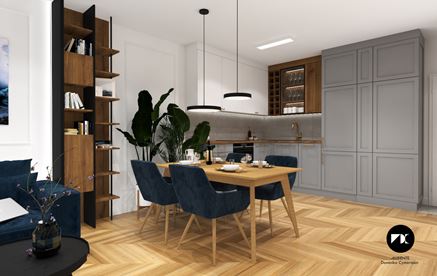 Szary aneks z ramowanymi frontami i drewnianym stołem jadalnym