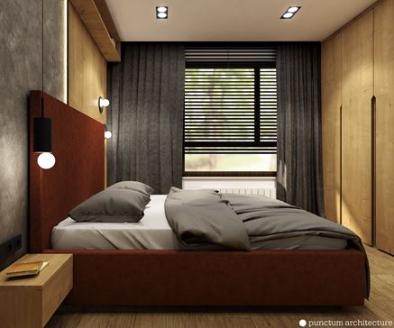 Szara sypialnia z drewnem i pomarańczowym łóżkiem