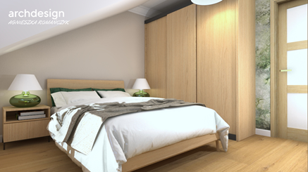 Sypialnia na poddaszu z garderobą i drewnianymi meblami