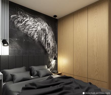 Sypialnia z czarną tapetą z motywem skrzydła