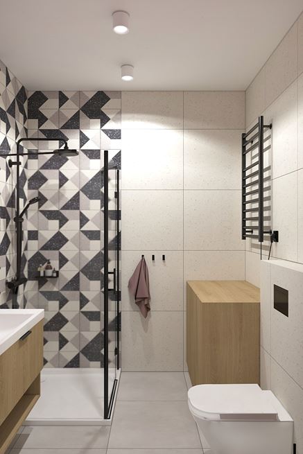 Jasna łazienka z płytkami z geometrycznym kształtem pod prysznicem