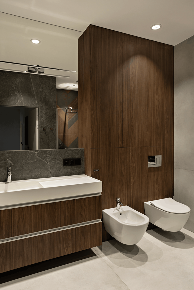 Czerń i brązowe drewno w łazience, projekt AVO Architects