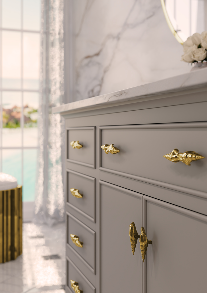 Szafka z uchwytami w ksztalcie muszelek.png