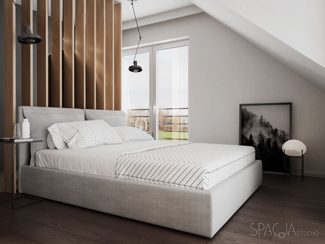 Sypialnia na poddaszu w bieli i drewnie