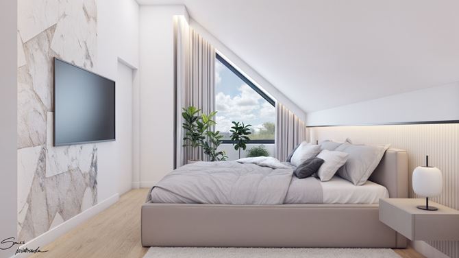 Biała sypialnia na poddaszu z dekoracyjną tapetą za telewizorem