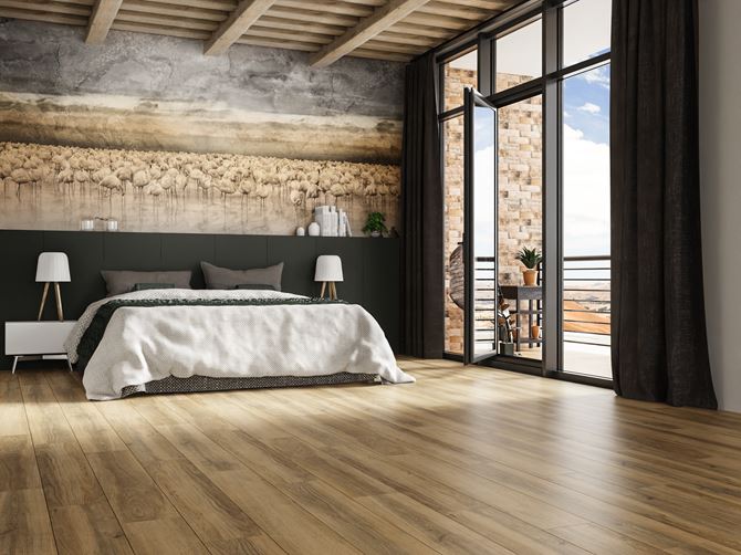 Sypialnia w minimalistycznej aranżacji wykończona drewnem