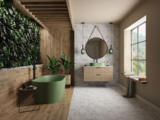 Patchworki i drewno w łazience z zieloną wanną