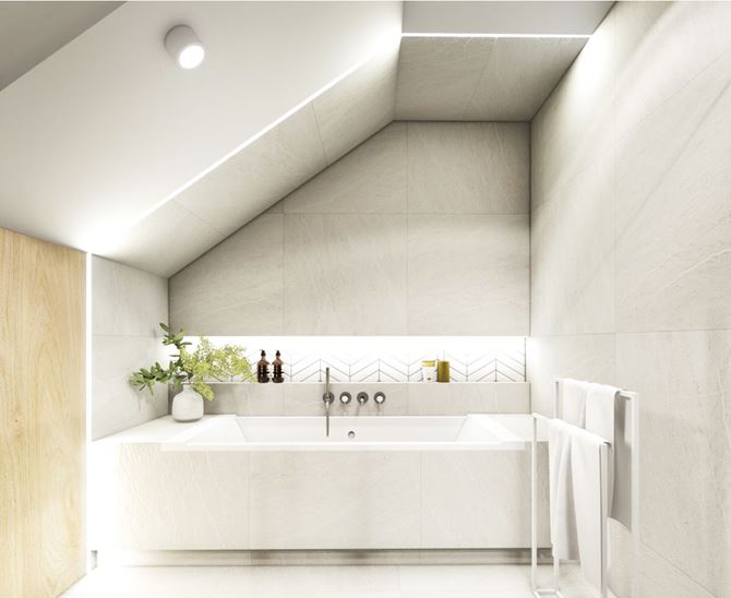 Strefa kąpielowa pod skosem wykończona płytkami ze wzorem betonu