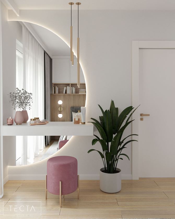 Toaletka z asymetrycznym lustrem w sypialni