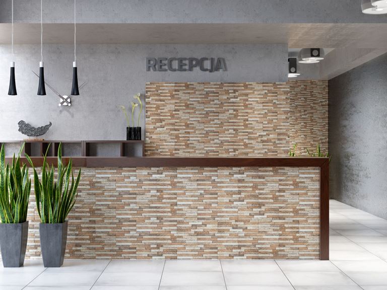 Hotelowa recepcja w strukturze kamienia Cerrad Kallio