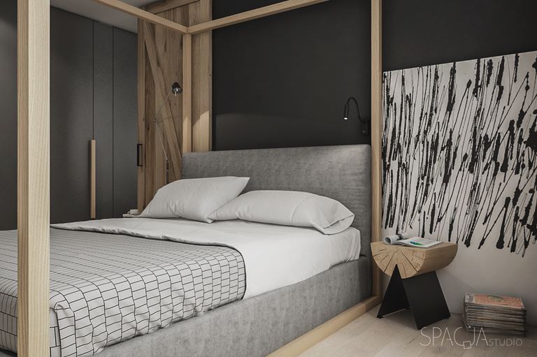 Czarna sypialnia z łóżkiem w drewnianej ramie