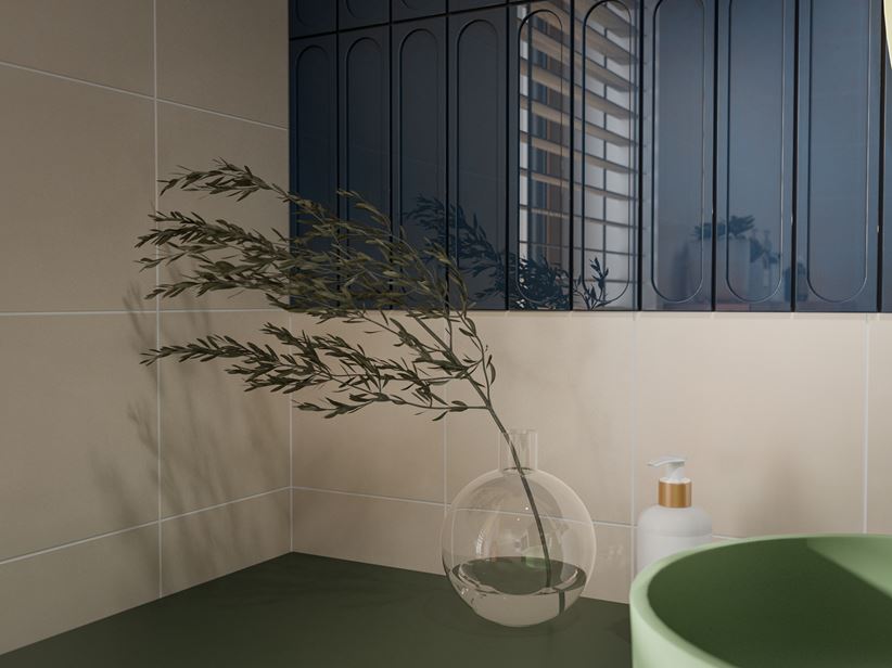 Detal granatowych cegiełek na ścianie w łazience