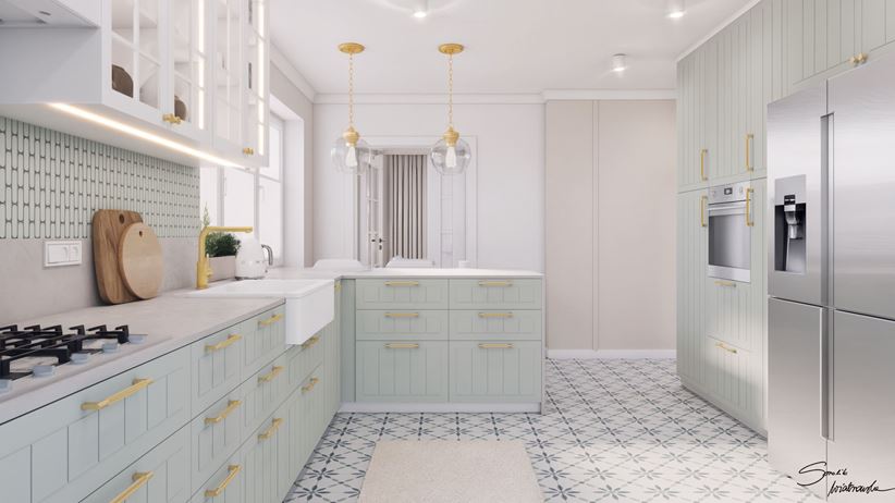 Miętowa zabudowa meblowa w kuchni z patchworkiem na podłodze