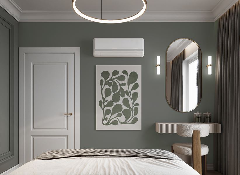 Sypialnia w szałwiowej zieleni z białą toaletką