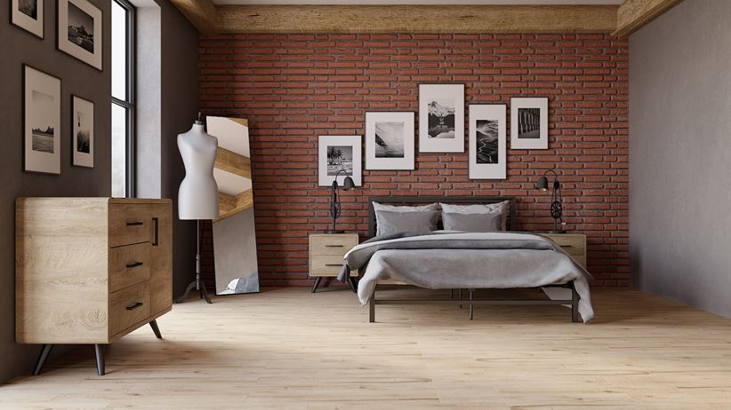 Cegiełki i jasne drewno w stylowej sypialni