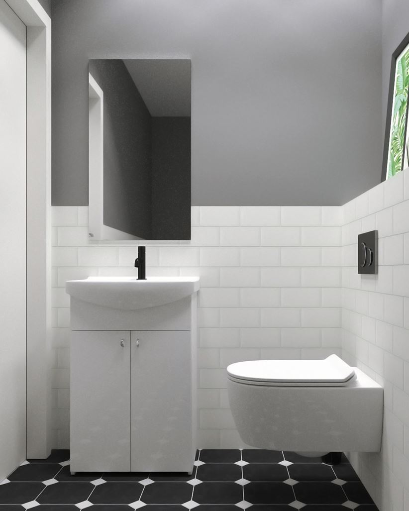 Toaleta z białą, ceglastą ścianą