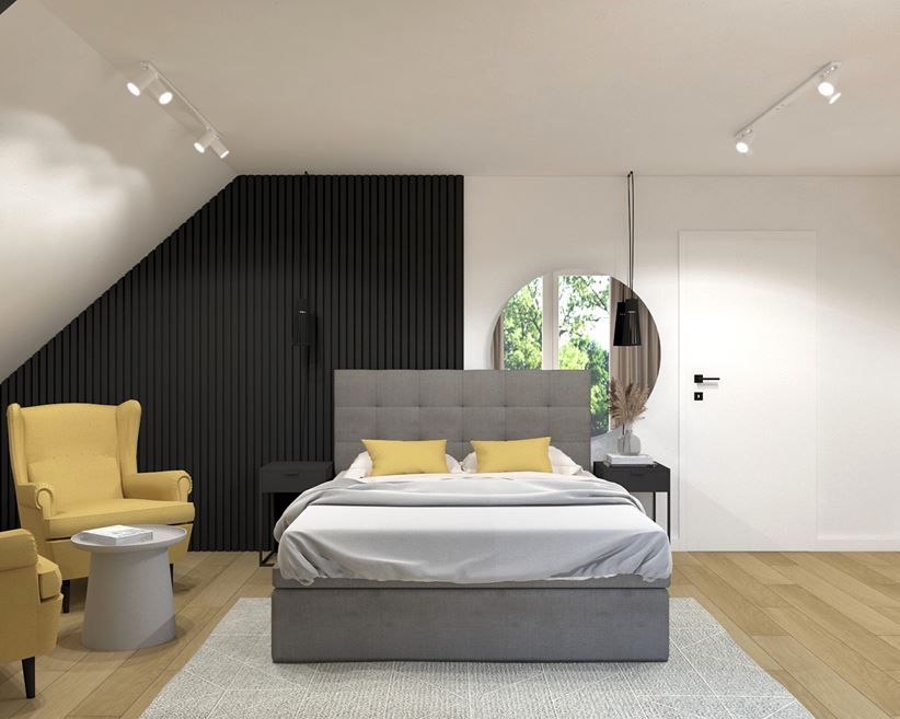 Jasna sypialnia na poddaszu z czarnym panelem dekoracyjnym