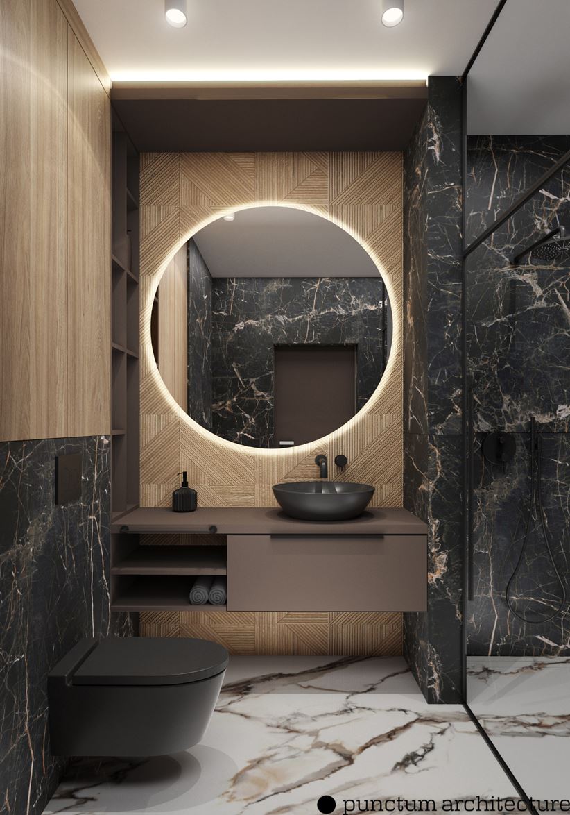 Łazienka z marmurem, wyposażona w czarną ceramikę