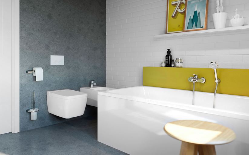 Aranżacja łazienki z ceglastą ścianą z żółtymi dodatkami