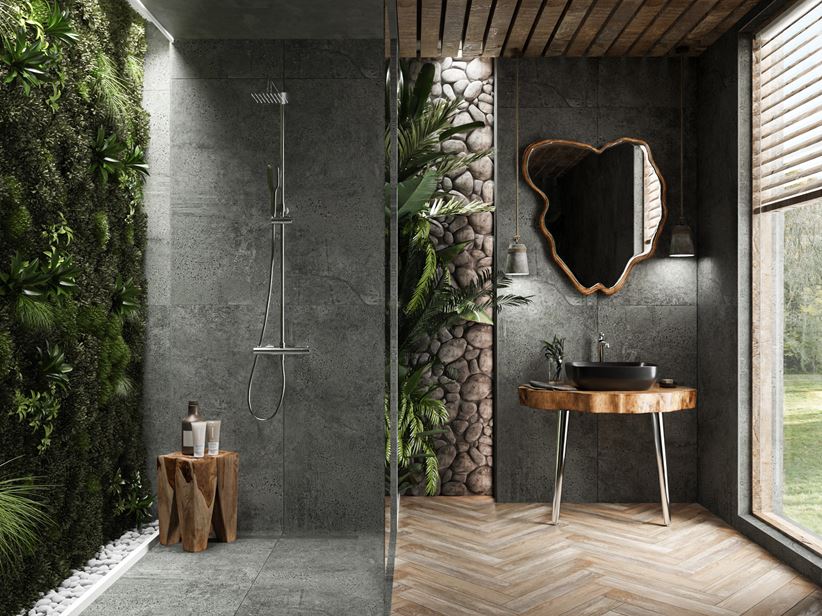 Ciemny kamień i drewno w stylowej łazience z zielonymi akcentami