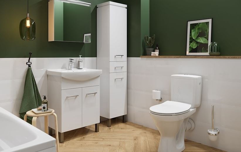 Biało-zielona łazienka z umywalką meblową i kompaktem WC
