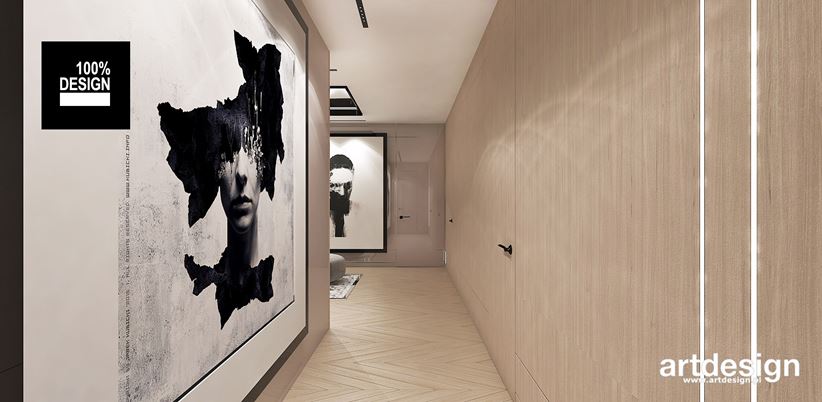 Fornirowana ściana i wielkoformatowe obrazy - pomysł na korytarz