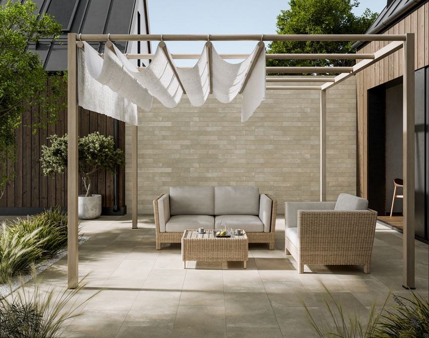 Taras z wypoczynkiem w jasnych cegiełkach 