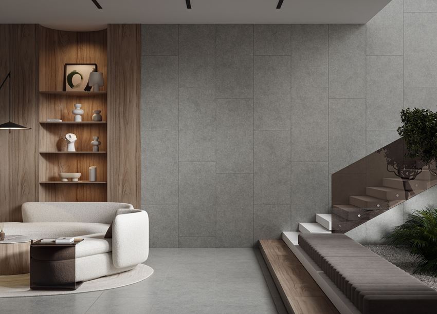 Szare wykończenie ściany w salonie ze schodami