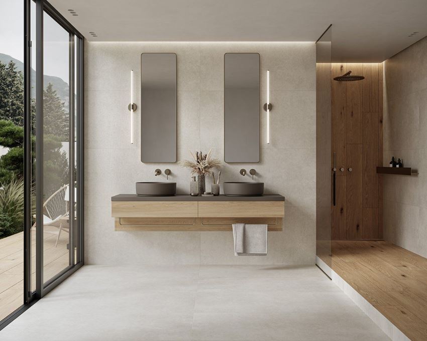 Duża łazienka w jasnobeżowym betonie i drewnie